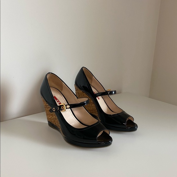 Prada Shoes - Prada Black Patent Leather & Woven Straw Wedges